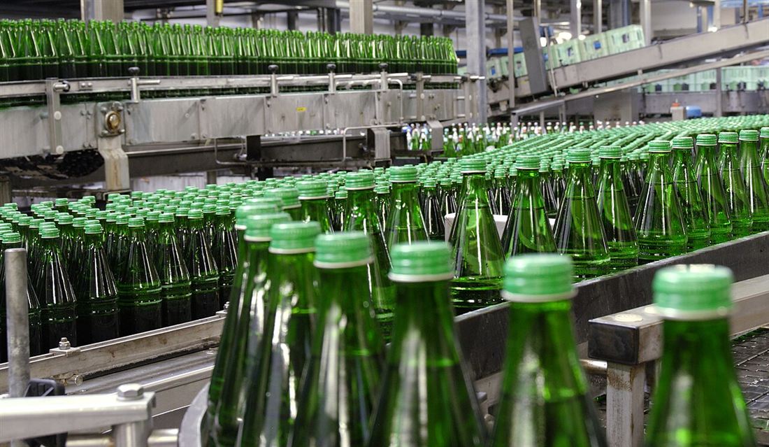 Glass bottles on a filling line